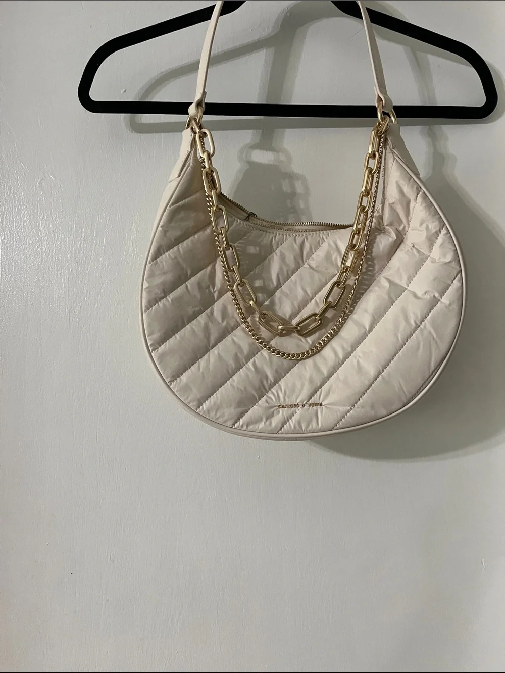 Charles & Keith Cream Quilted Crescent Bag with Gold Chains